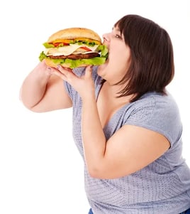 photo-woman-eating-hamburger